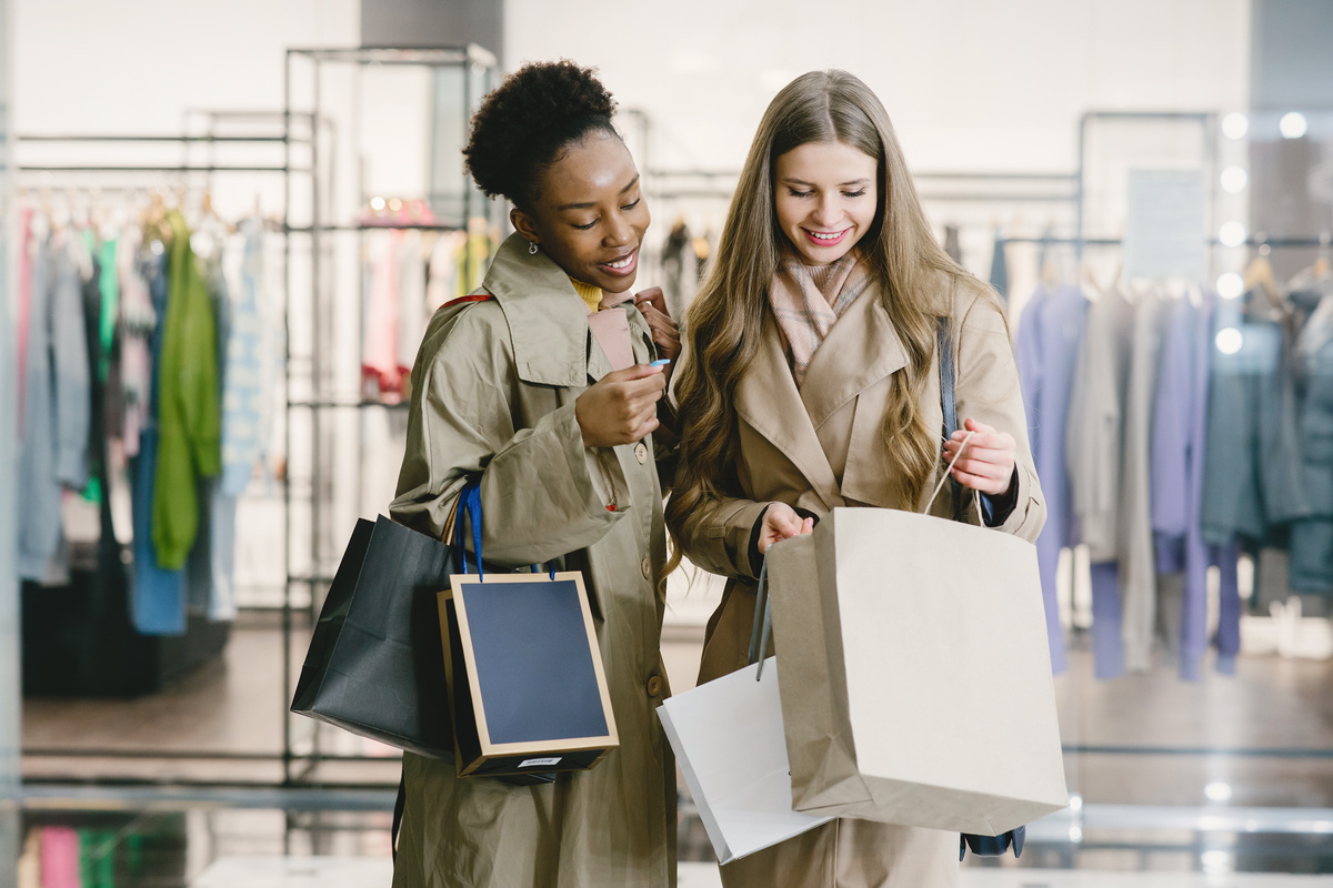 A Woman Holding a Brown Shopping Bag